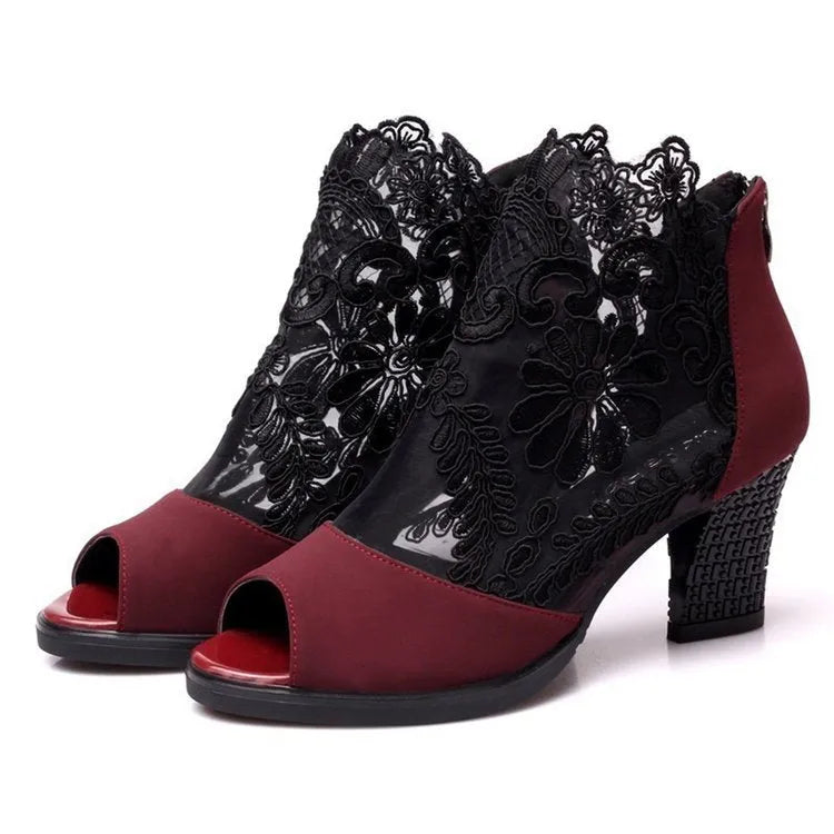 Black lace gladiator sandals for women with a square high heel, peep toe, and a zip closure.