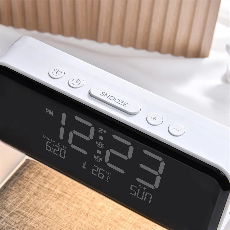 White 3-in-1 bedside table lamp with wireless charging pad, LCD screen, and touch dimmer.