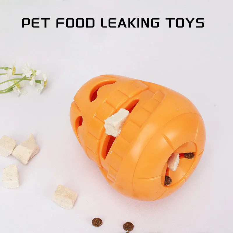 Orange Halloween pumpkin shaped interactive dog chew toy with a treat-dispensing funnel.