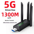 Black USB network transmitter with four antennas for computer wireless connectivity