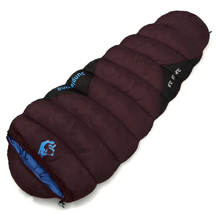 Army green cotton-filled camping sleeping bag with compression storage sack.
