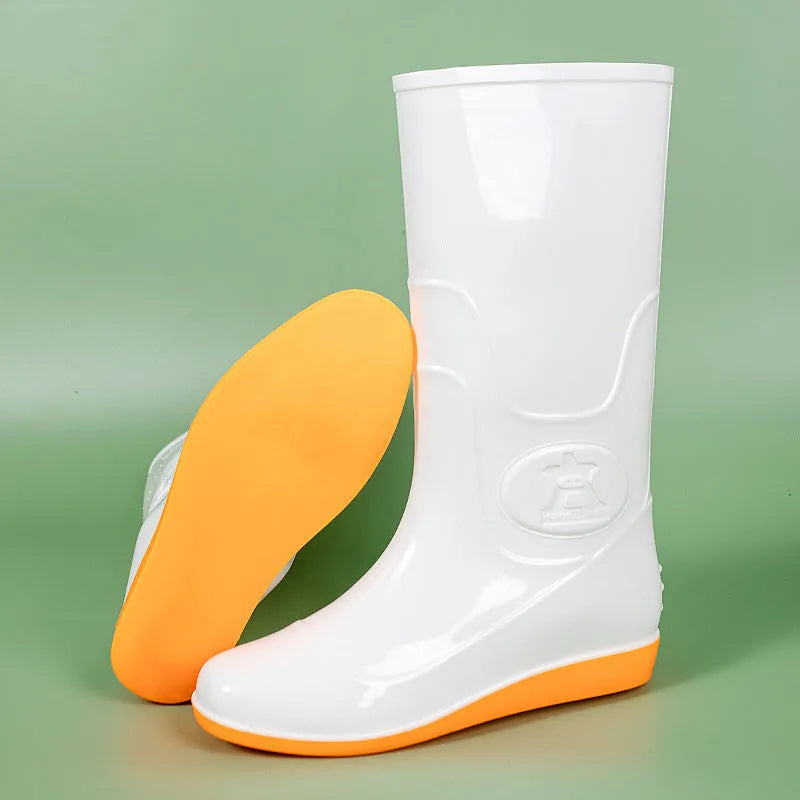 Men's flat washable plastic rain boot in white, showing high tube design and round toe.