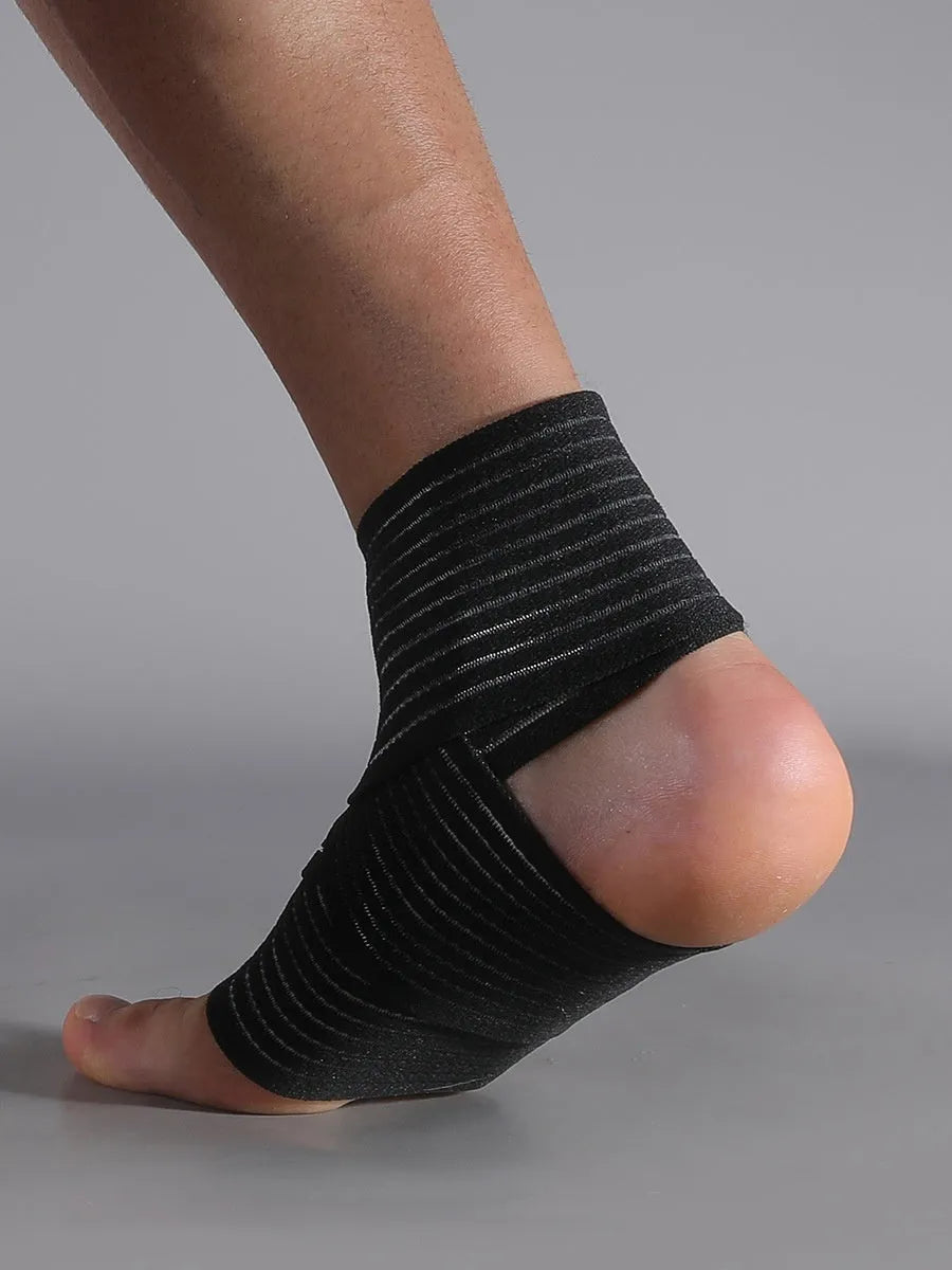 Adjustable black sports ankle support bandage for running, basketball, and athletic activities