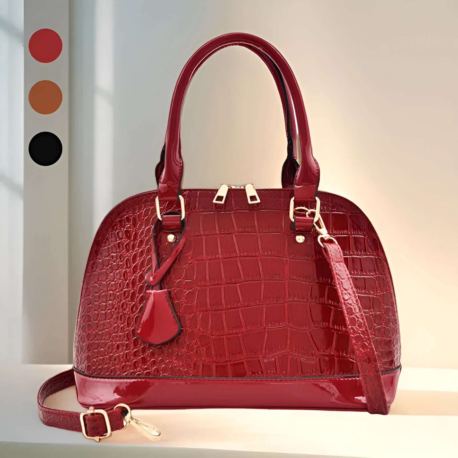 Women's shiny PU leather crossbody shoulder bag showing black, brown, and red colour options with 22x30x15cm dimensions