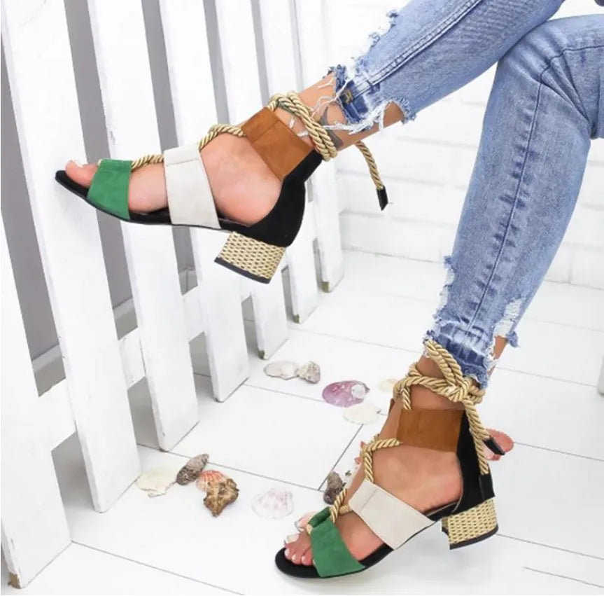 Women's beige suede sandals with fish mouth toe, front strap, ankle strap, and a thick middle heel.