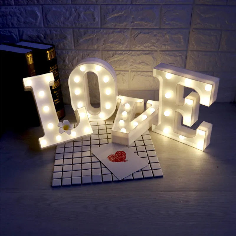 White plastic LED marquee sign letter lamp, 22 cm high, with warm white glow and battery compartment