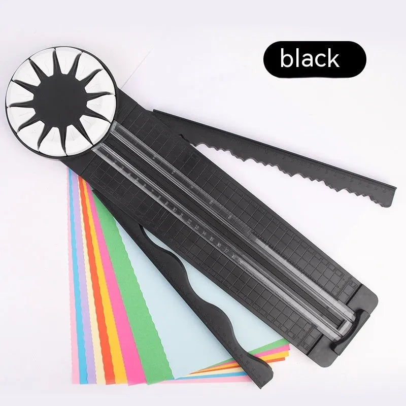 Pink and black multifunctional 12-in-1 dotted plastic paper cutter machine for crafts.