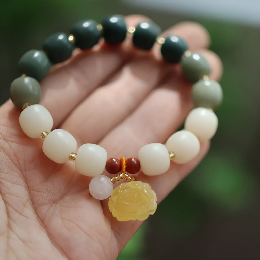 Gradient white jade Bodhi root bracelet with 10mm flower beads and natural beeswax lotus detail