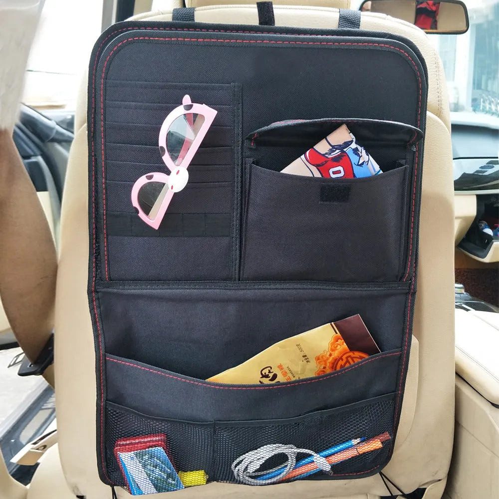 Black Oxford cloth car seat back storage bag with multi pockets and red stitching, 38x60cm