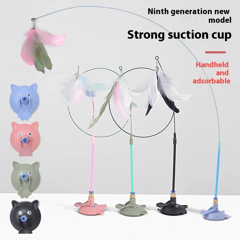 Plastic cat teaser toy with suction cup mount and dangling feather attachment