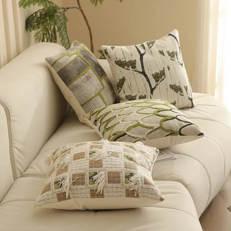 45cm square jacquard cushion cover with detailed floral pattern in retro Nordic style, shown in one of eight available colours.