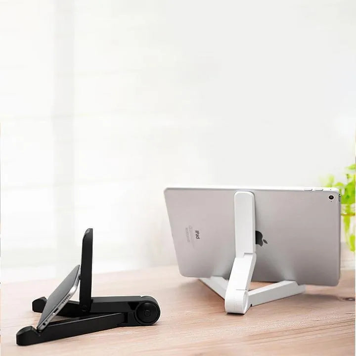 Black foldable tablet holder standing upright with a tablet in landscape mode on a desk