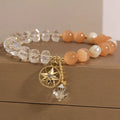 Orange women's bracelet with eight Awn star design and gold-plated inlaid stone.