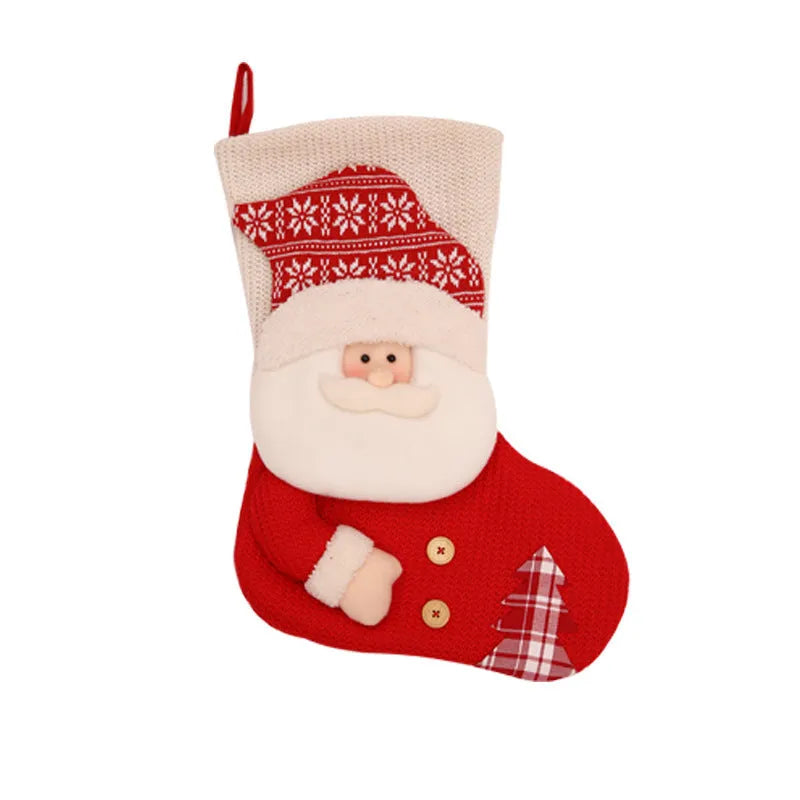 Large red and white knitted Christmas stocking with Santa Claus design hanging from fireplace