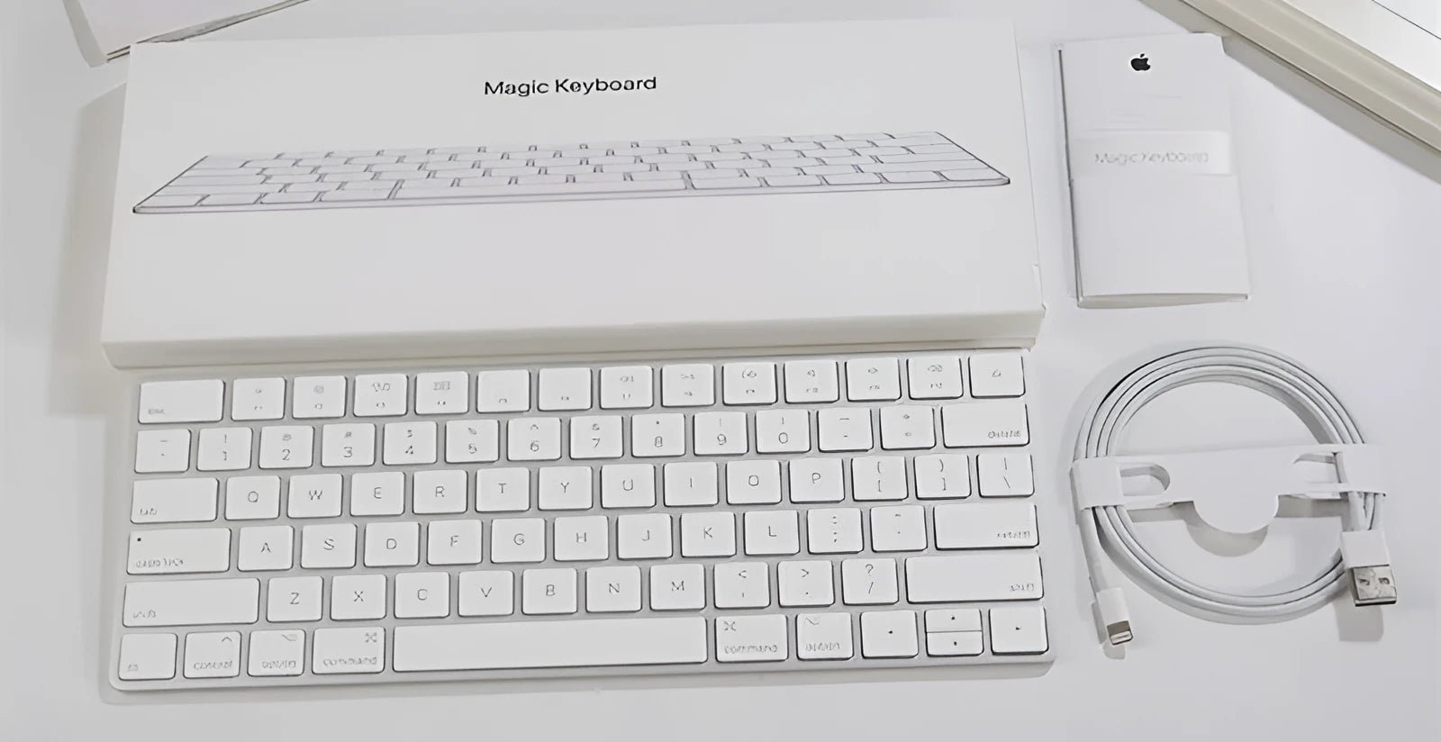 White ultra-thin metal Bluetooth wireless keyboard with multimedia function keys for Apple devices