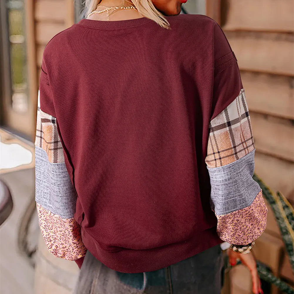 Women's loose fit long-sleeved top with plaid stitching in apricot colour.