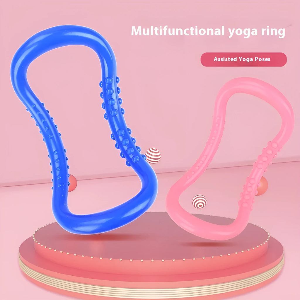 Purple, blue, and pink coloured yoga stretching ring for Pilates and back opening exercises.