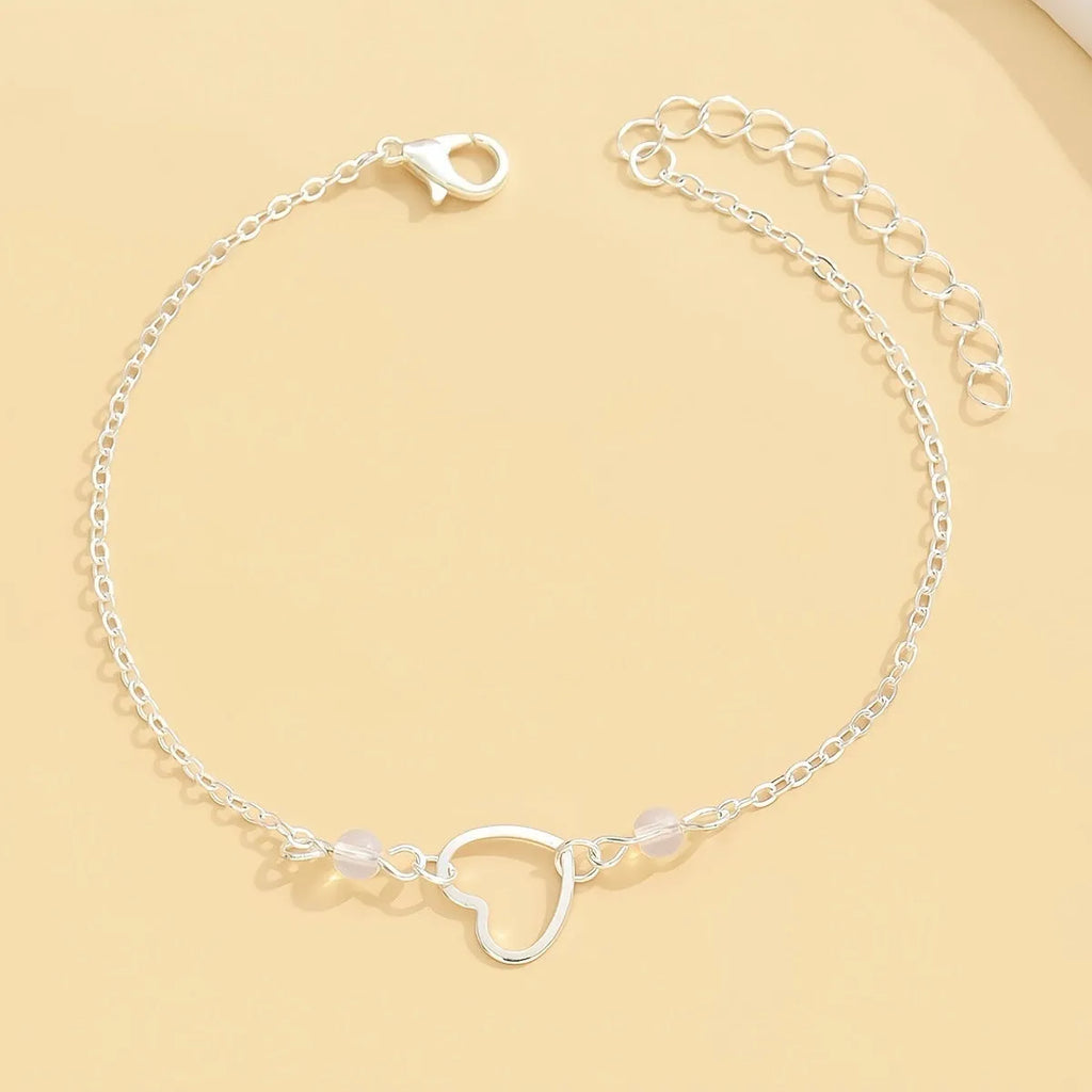 Gold or silver women's anklet with adjustable design and heart-shaped geometric pendant