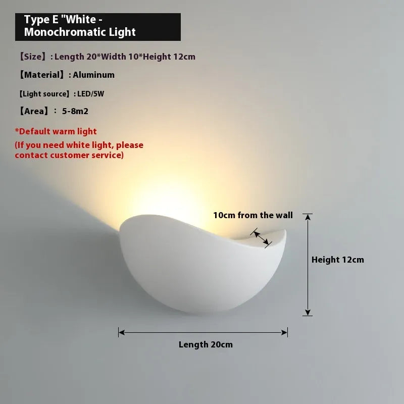 Black and white aluminium alloy waterproof IP65 LED lamp for courtyard and indoor use.