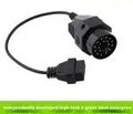BMW 20-pin to 16-pin OBD2 diagnostic port adaptor cable on a white background.
