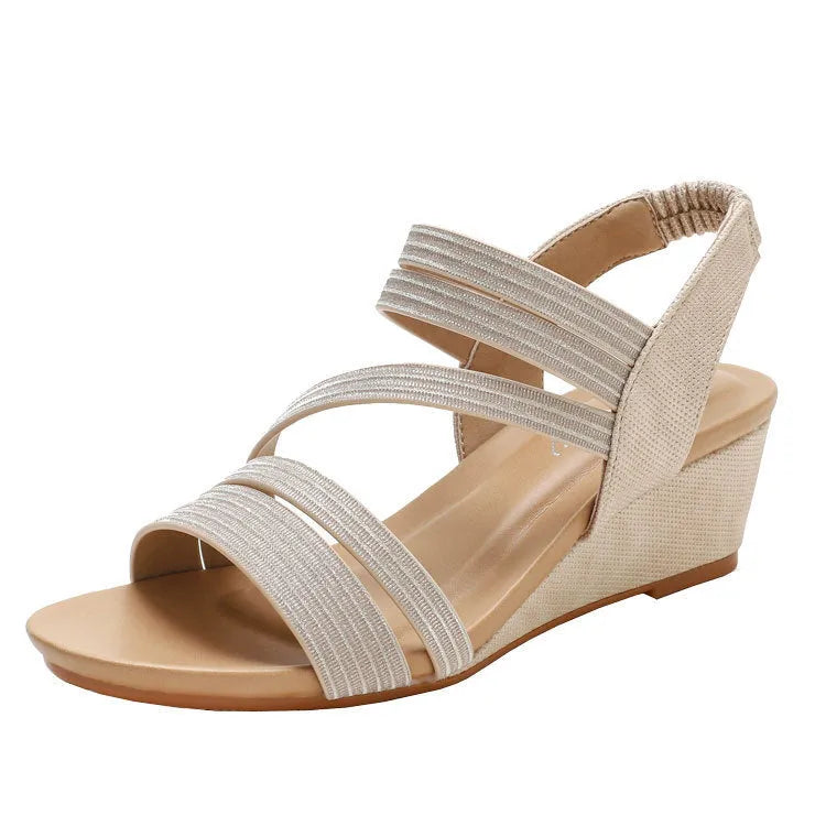 Women's platform sandals in gold colour with a soft leather sole and artificial PU upper