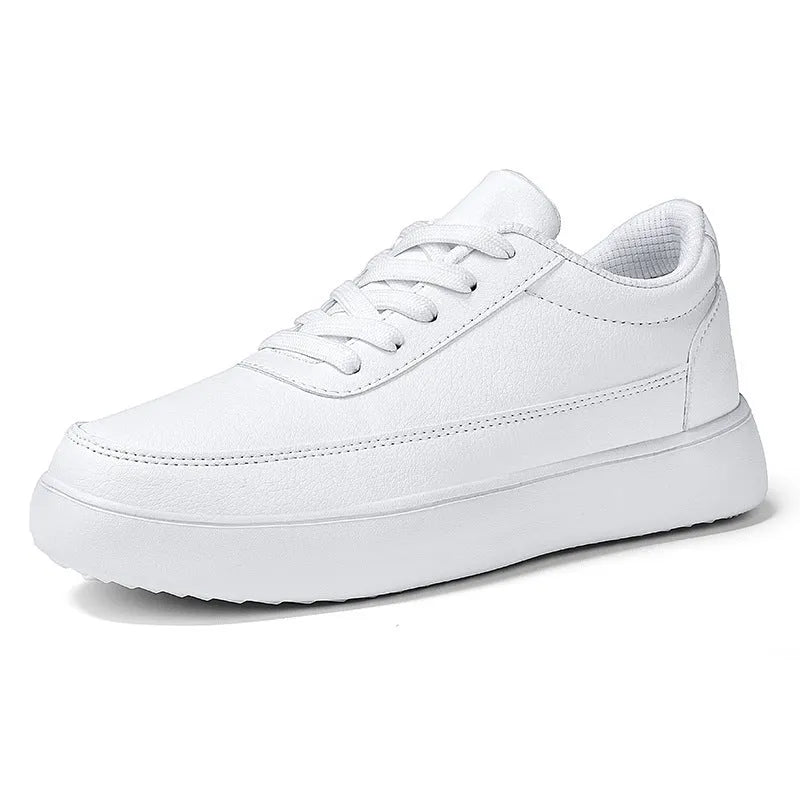 Women's white leather lace-up flat casual shoes shown from the side.