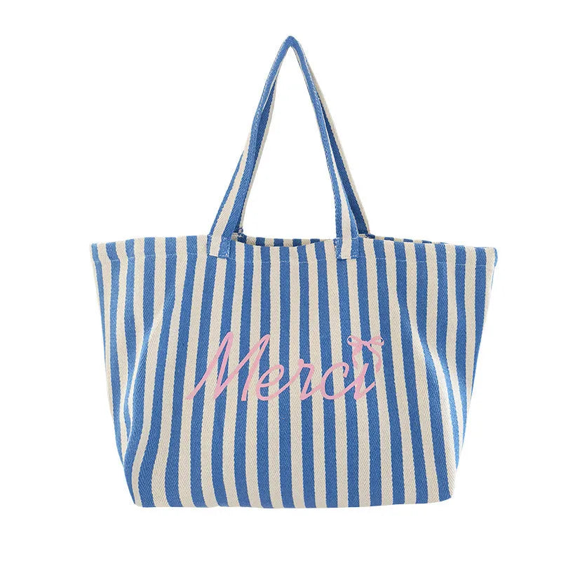 Blue striped letters printed on pink blue and white striped cotton canvas bag
