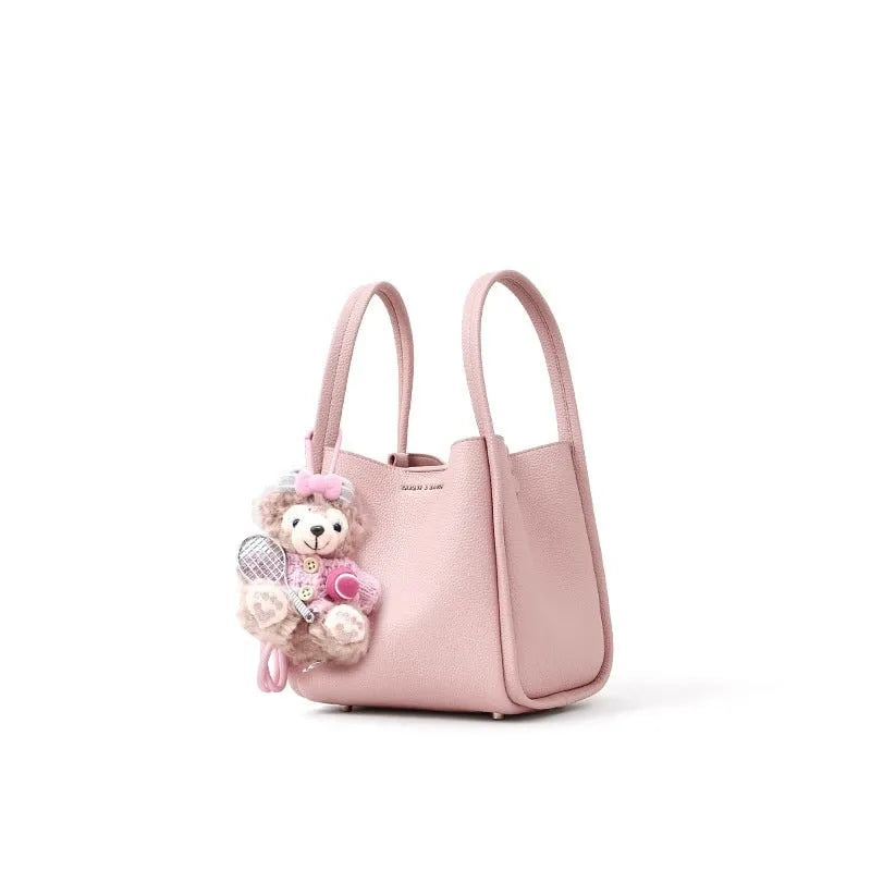 Genuine leather bucket shoulder bag for women, 20x16x19cm, pink colour, with sewing thread and lock detail