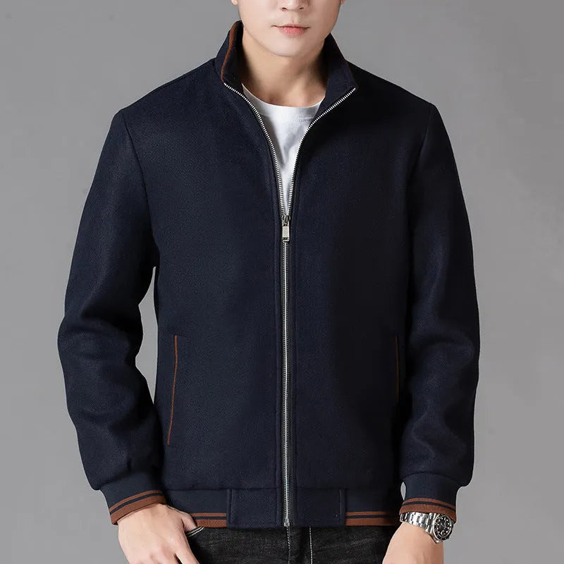 Men's grey sport fleece jacket with long sleeves and a stick pocket, shown on a hanger.