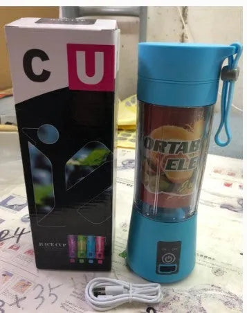 Mini USB electric citrus juicer with carry rope in pink, purple, blue, or green colours