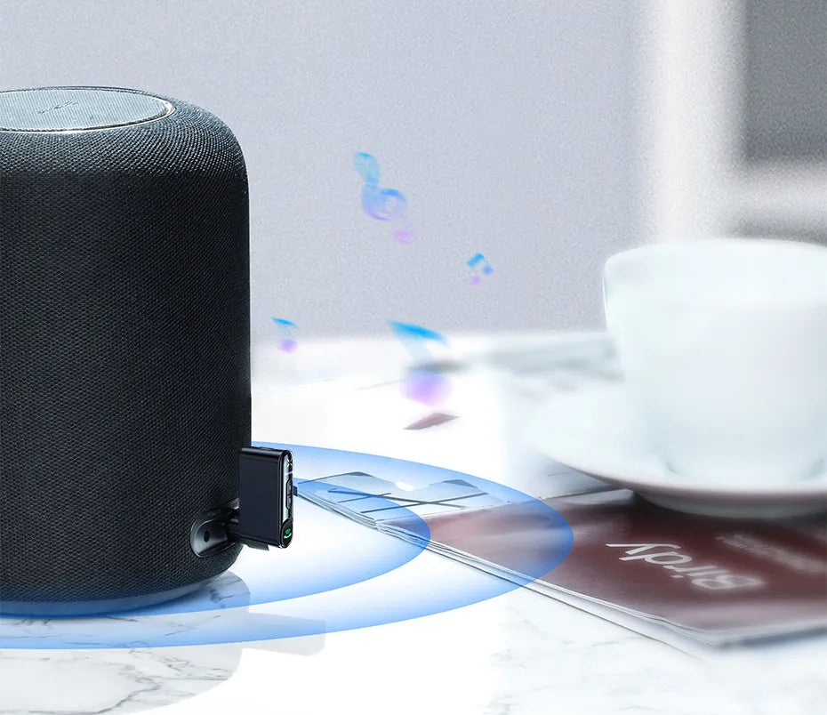 Black car Bluetooth receiver with 3.5mm plug and USB charging cable
