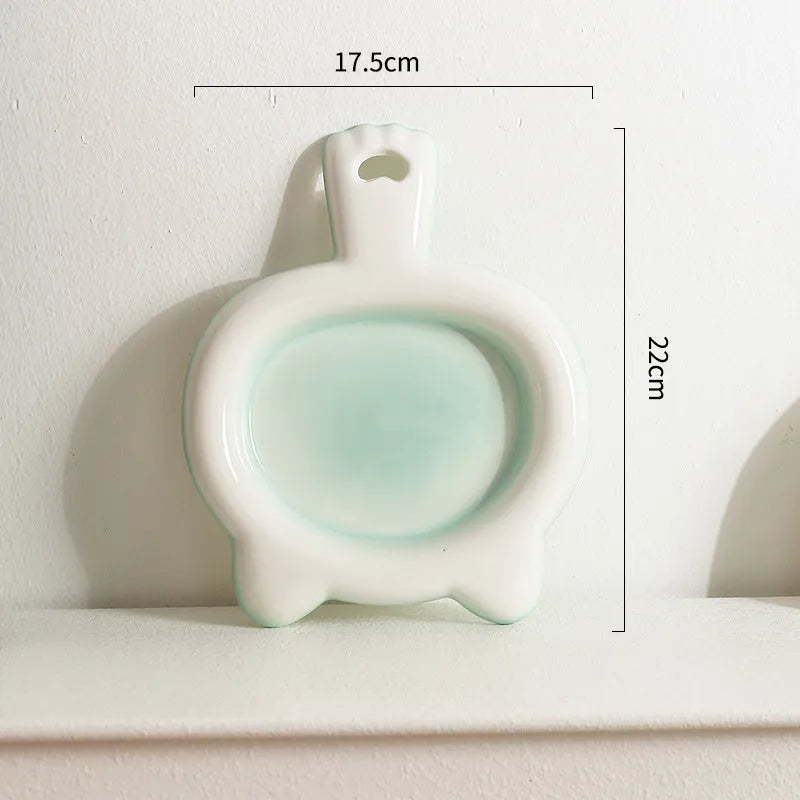 Ceramic cat bowl with shallow design in selected colour showing curved edges for spillage reduction