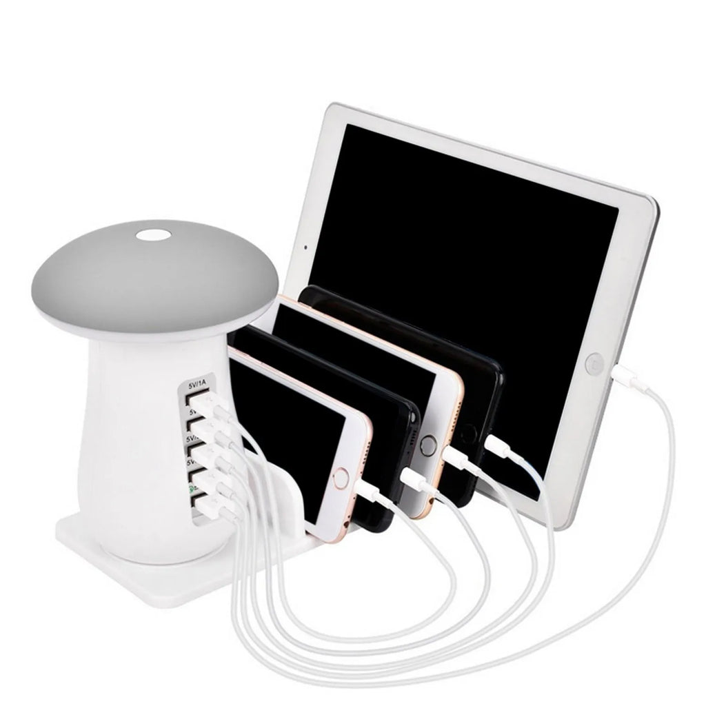 White glossy mushroom-shaped LED desk lamp with a built-in 5-port USB charging station for smartphones and tablets.