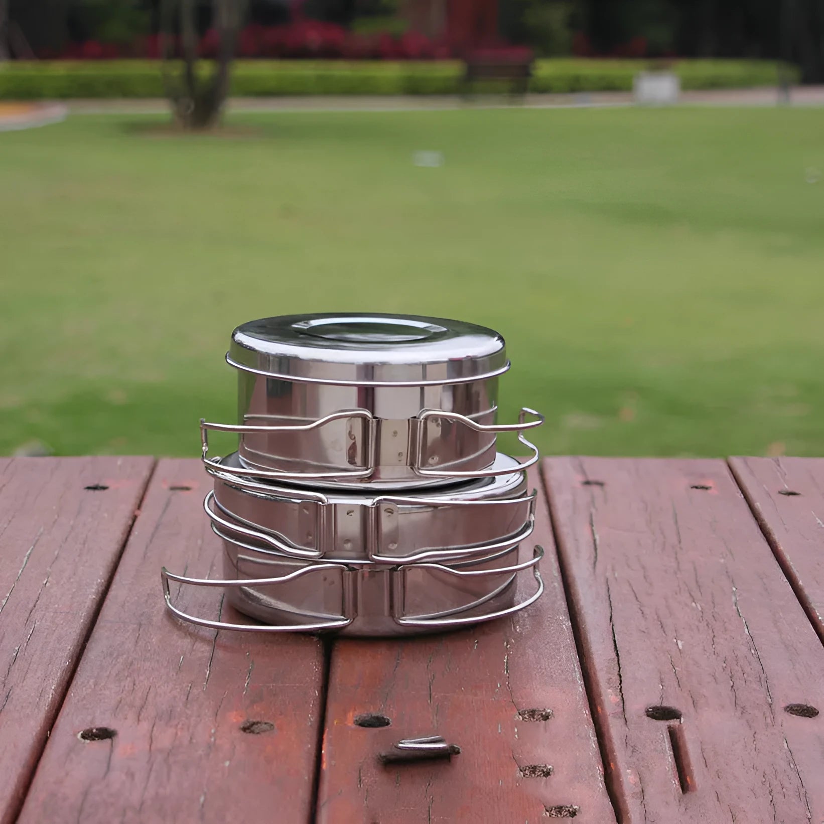 Silver stainless steel outdoor camping cookware pot set with round 4-piece configuration