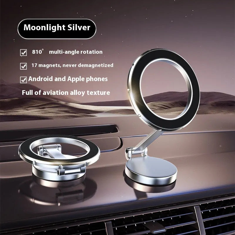 Vacuum magnetic suction phone bracket in black on car dashboard holding a smartphone