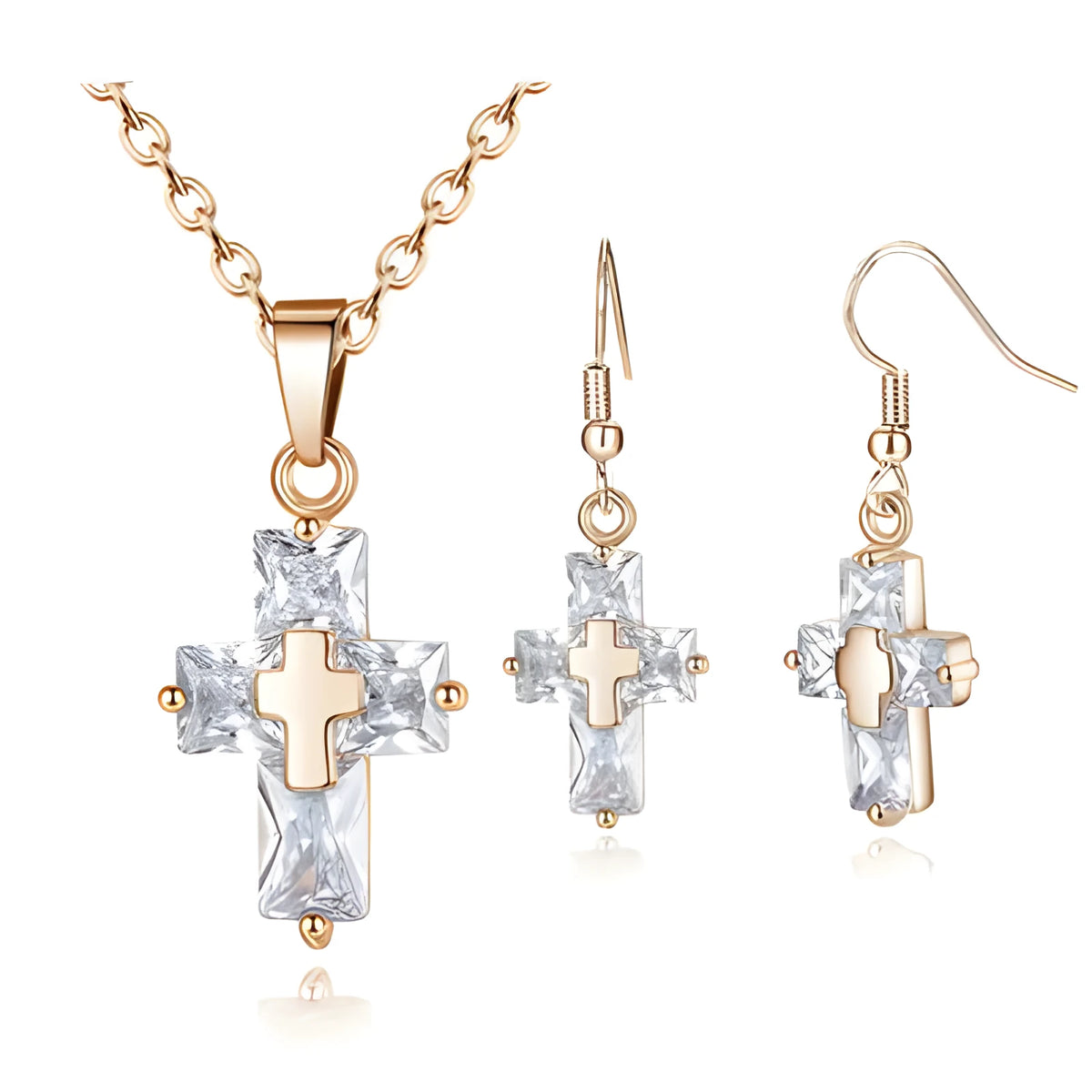 Copper cross ornament set with a 1.2 x 2.2 cm pendant and 3.3 x 1.2 cm studs in gold or silver plated finish