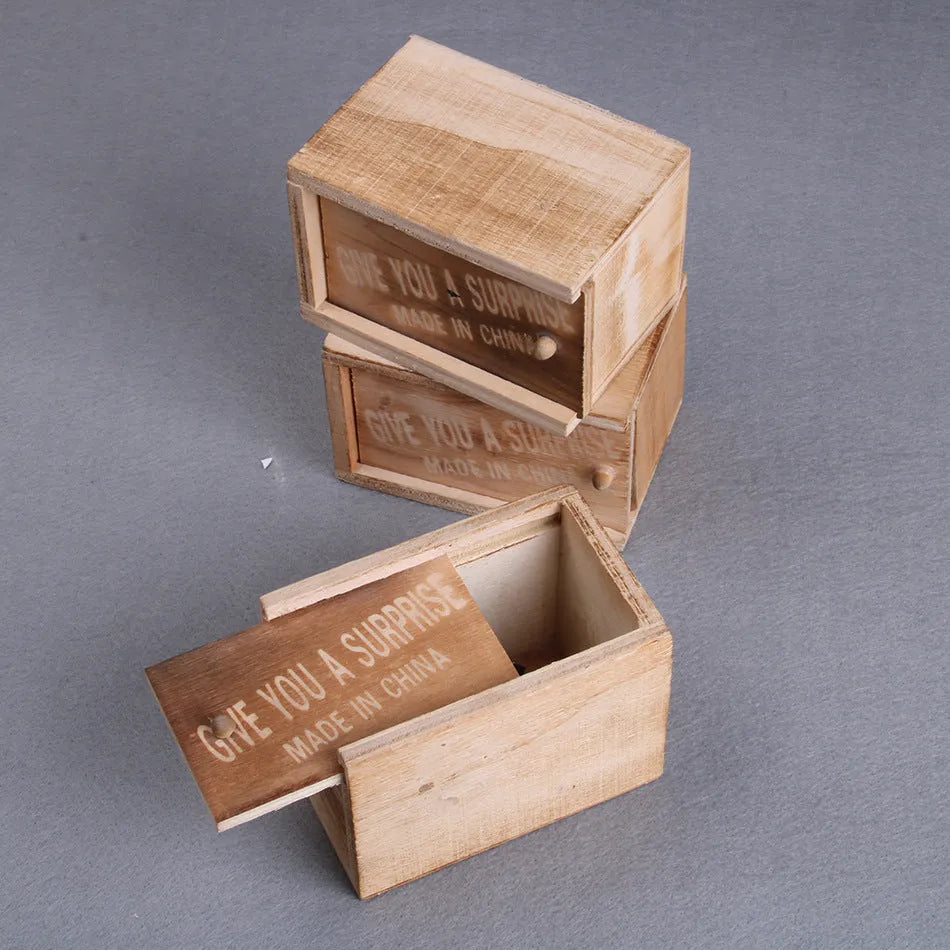 Wooden prank scare box measuring 9.1cm with a random jumping animal surprise inside