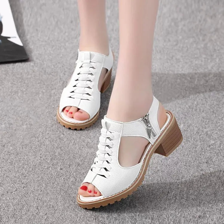 Women's black retro sandals with a side zipper and a mid-heel.