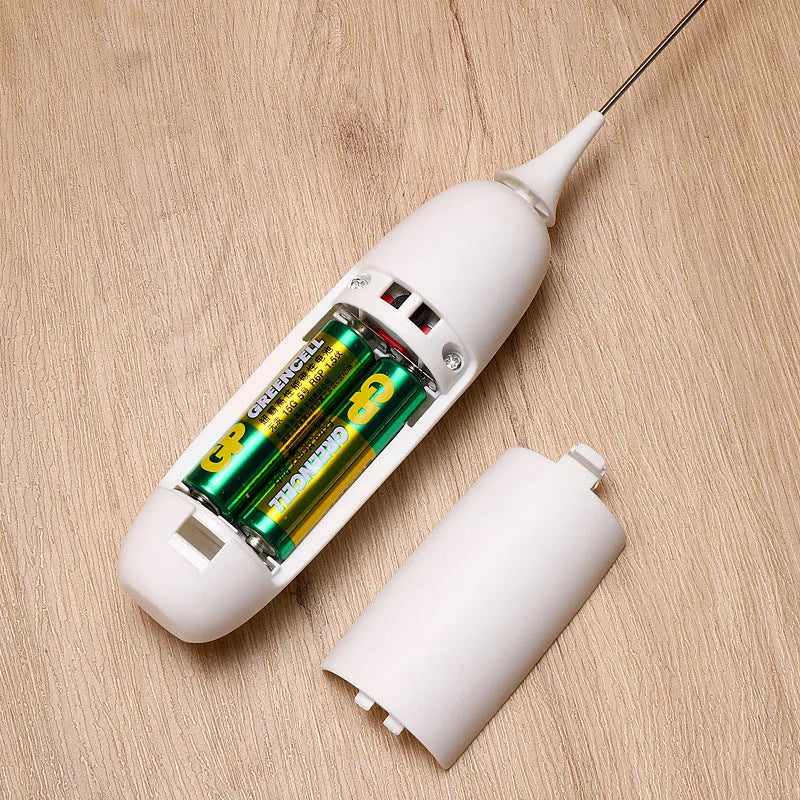 Electric hand-held milk frother in modern simplicity design for coffee preparation