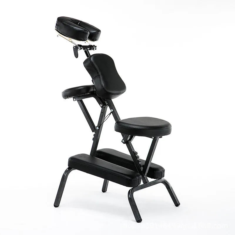 Folding massage chair in black with PVC leather seat and wood steel frame for tattooing and massage use