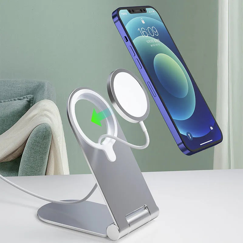 Silver vertical adjustable magnetic car bracket for iPhone 12 mounted on dashboard