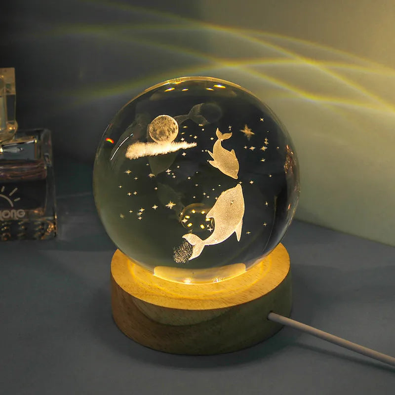 Transparent crystal ball night lamp with 3D carved jellyfish design, showing 6cm size on round base.