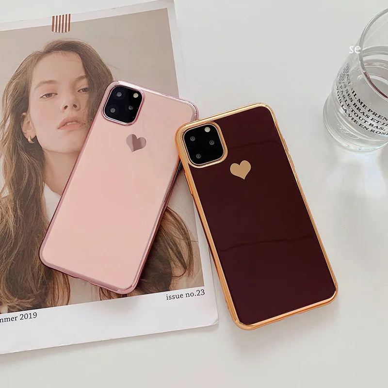 Solid colour TPU phone case for iPhone shown in blue, claret, pink and green options.
