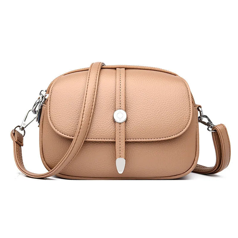 City Simple women's oval crossbody bag in soft PU leather available in black, khaki, or dark brown