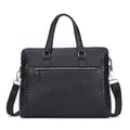 Men's genuine black leather horizontal briefcase with embossed geometric pattern, soft handle, and slit pocket for 14-inch laptop