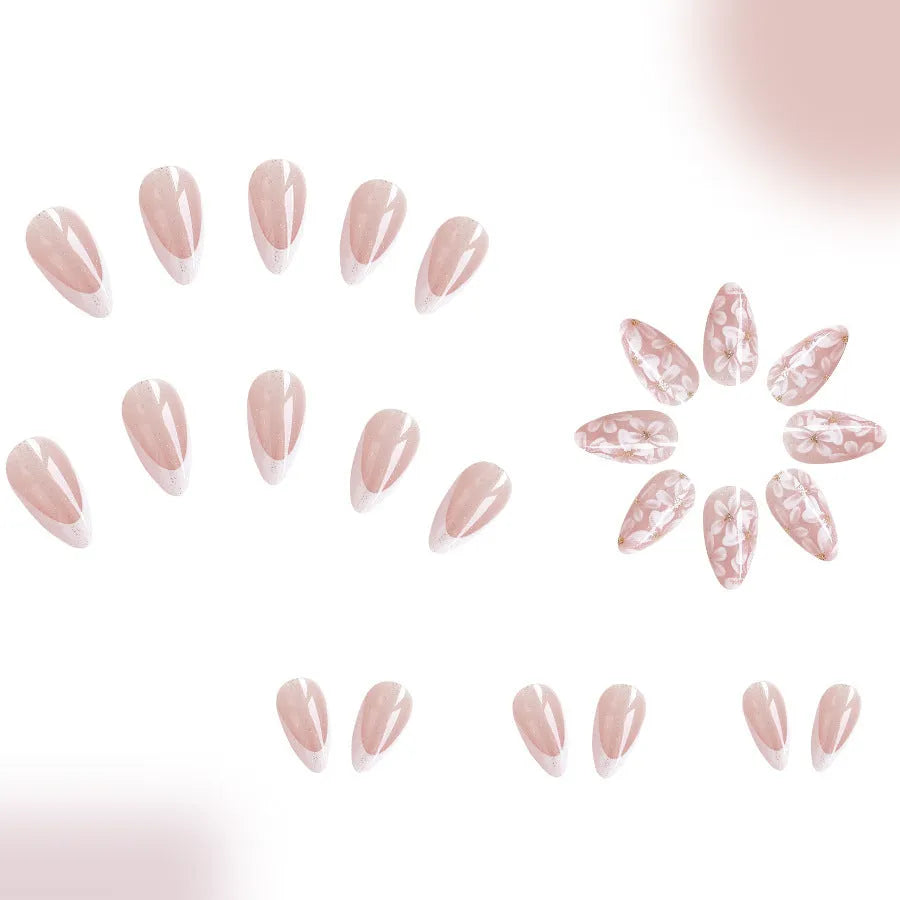 Short almond shaped French style false nails with glitter and floral patterns C625 colour