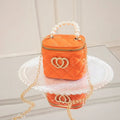 White PVC bucket bag with a red heart pattern, showing its shape and design.