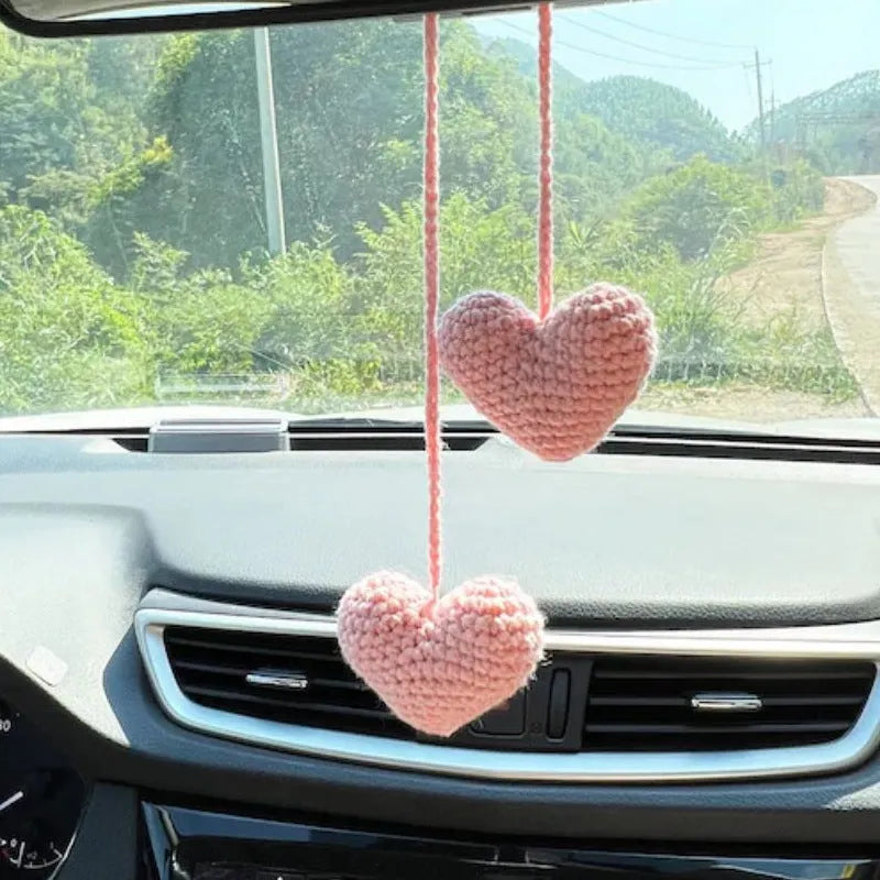 Green and white knitted wool plant ornament for car dashboard with hanging cord