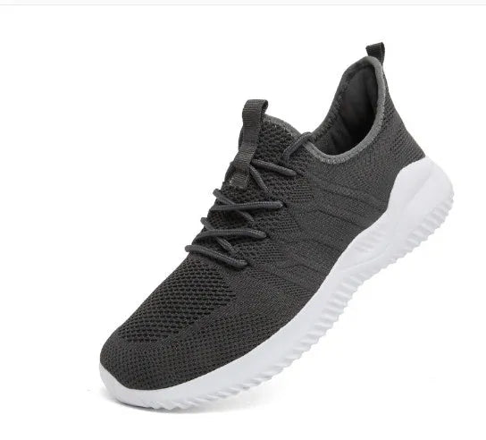 Men's black and white mesh sneakers with round toe and lace-up closure