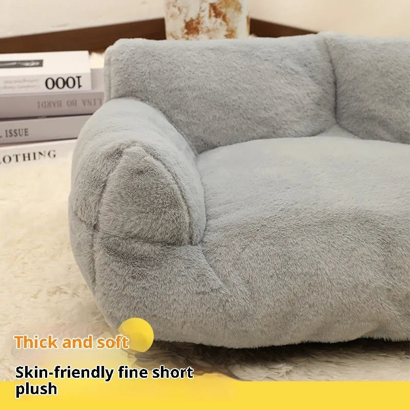 Large pink rabbit fur plush pet sofa bed for dogs with raised edges and anti-slip base